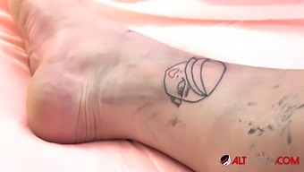 Big Tits And Big Asses Get Tattooed And Toyed By Evilyn